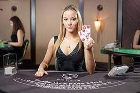 Multi-camera setup at rambo77 Galactic Gems studio showing live dealer at blackjack table