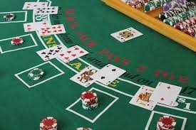 Taiwan Pools roulette table interface on rambo77 showing live wheel, betting board, and chat sidebar